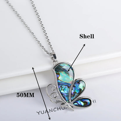 Abalone shell pendant necklace with copper electroplated animal zodiac design and butterfly or dragonfly detail