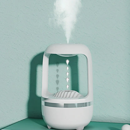 White anti-gravity humidifier showing upward water droplets with 500ml tank and USB-C cable
