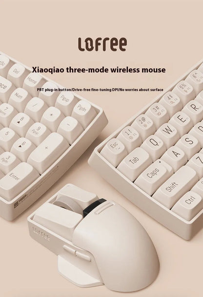 Xiaoqiao wireless mouse in tofu colour with ergonomic shape and four-way roller on desk