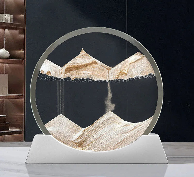 A rotary abstract night lamp with coloured sand falling inside clear glass, showing blue variant.