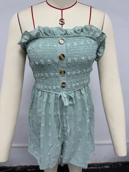 Women's off-shoulder sleeveless jumpsuit in polyester fabric with button detailing and mid-waist design