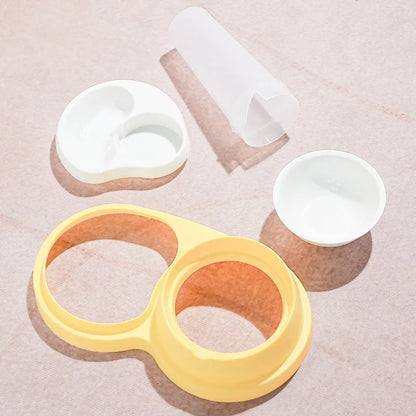 Grey and yellow double pet feeding bowl with raised neck protection and non-slip base.