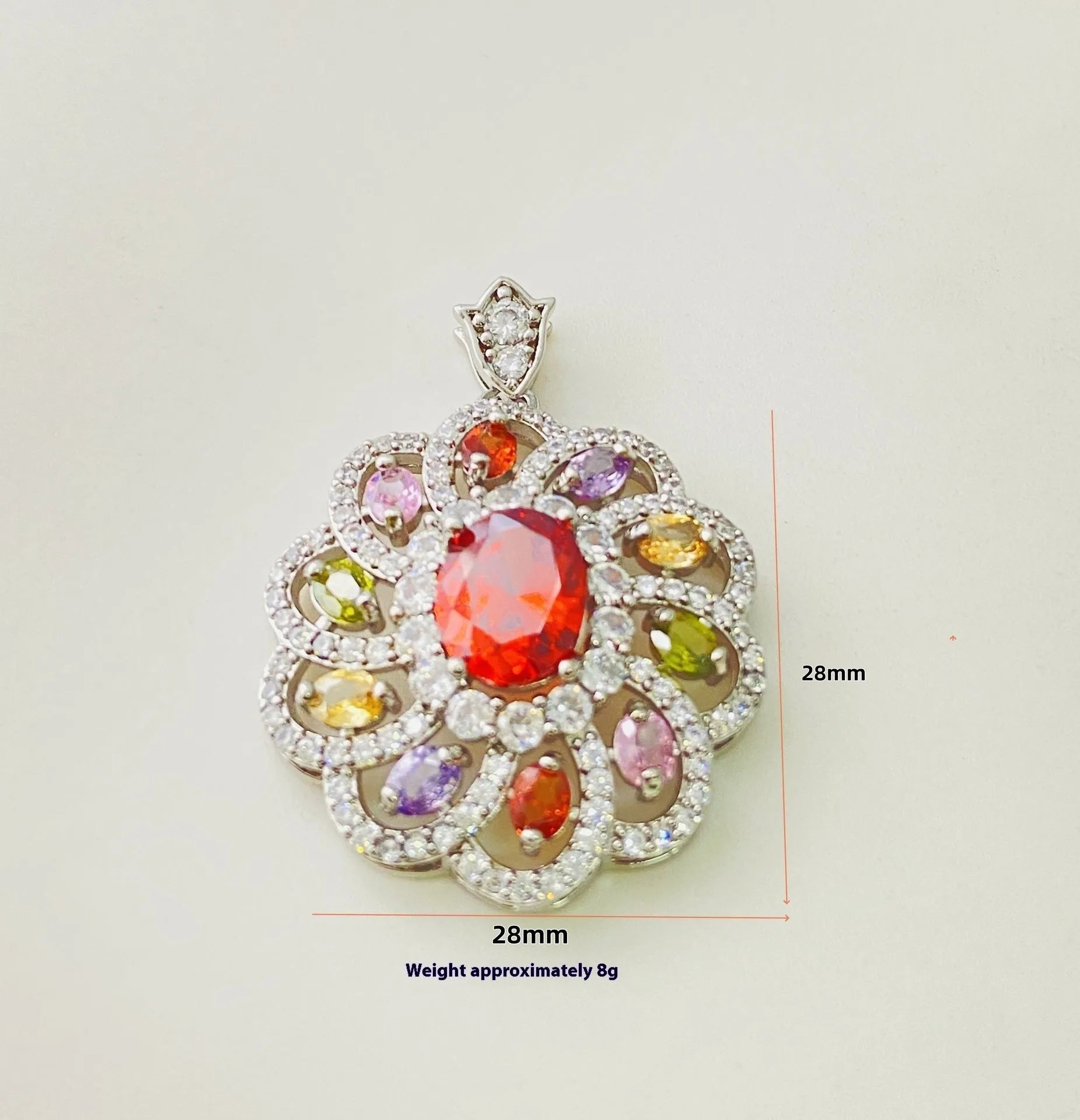 Close-up of a women's gold-coloured flower pendant necklace with a bright zircon stone centre.
