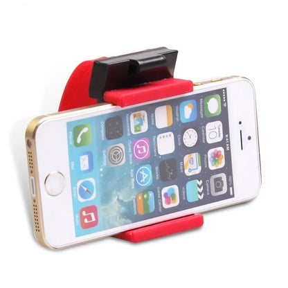 Black steering wheel phone holder with 75mm clip mounted on car wheel holding smartphone