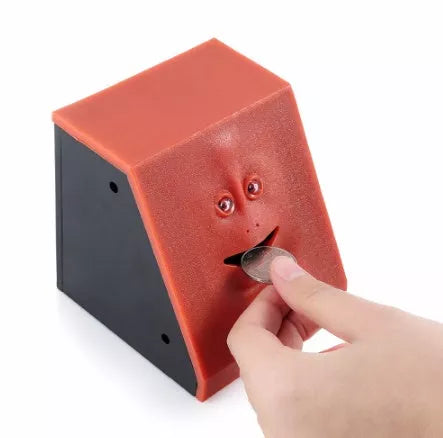 Face Intelligent Induction Electric Piggy Bank with realistic money-eating action in brick blue, pink, or red