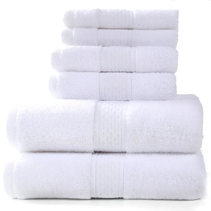 Cotton towel set showing bath towel, hand towel, and face cloth in coordinated sizes