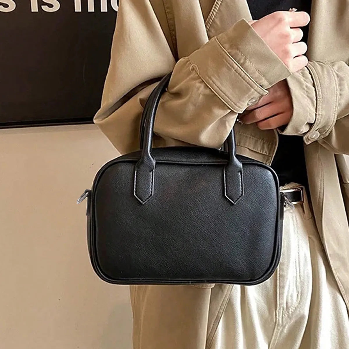 Retro square PU leather messenger bag with an adjustable shoulder strap in black colour.