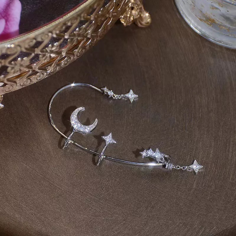 Moon Splash Star River no-pierce ear clips with heart-shaped design and artificial gemstones