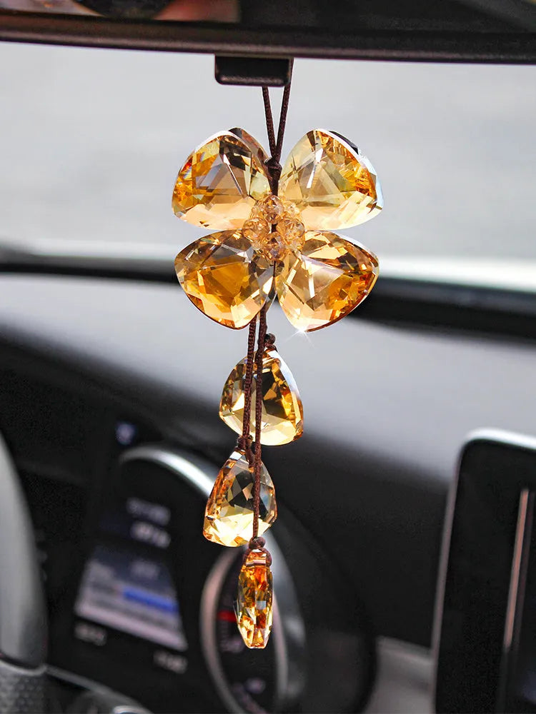 Crystal four leaf grass car interior pendant in transparent, champagne, black, or shiny finish, approximately 20cm long.