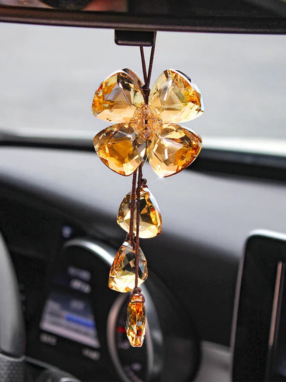 Crystal four leaf grass car interior pendant in transparent, champagne, black, or shiny finish, approximately 20cm long.
