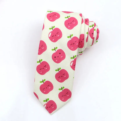 A narrow Korean-style cotton bow tie featuring a cartoon print, shown in a selection of colours.