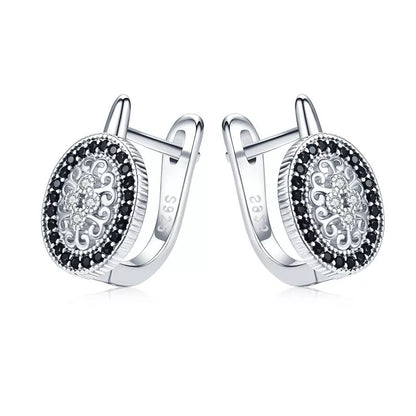 Black copper plated rhinestone earrings with round design