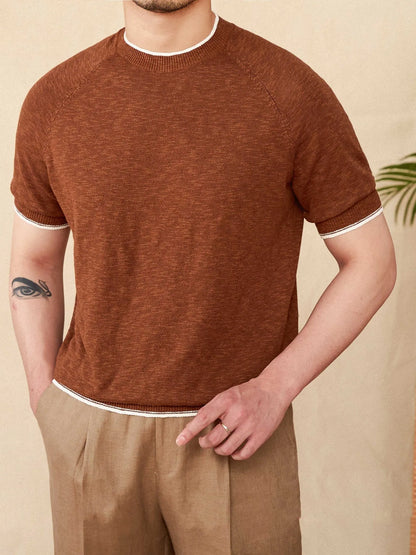 Brown linen-cotton blend short sleeve t-shirt with round neck on a hanger.