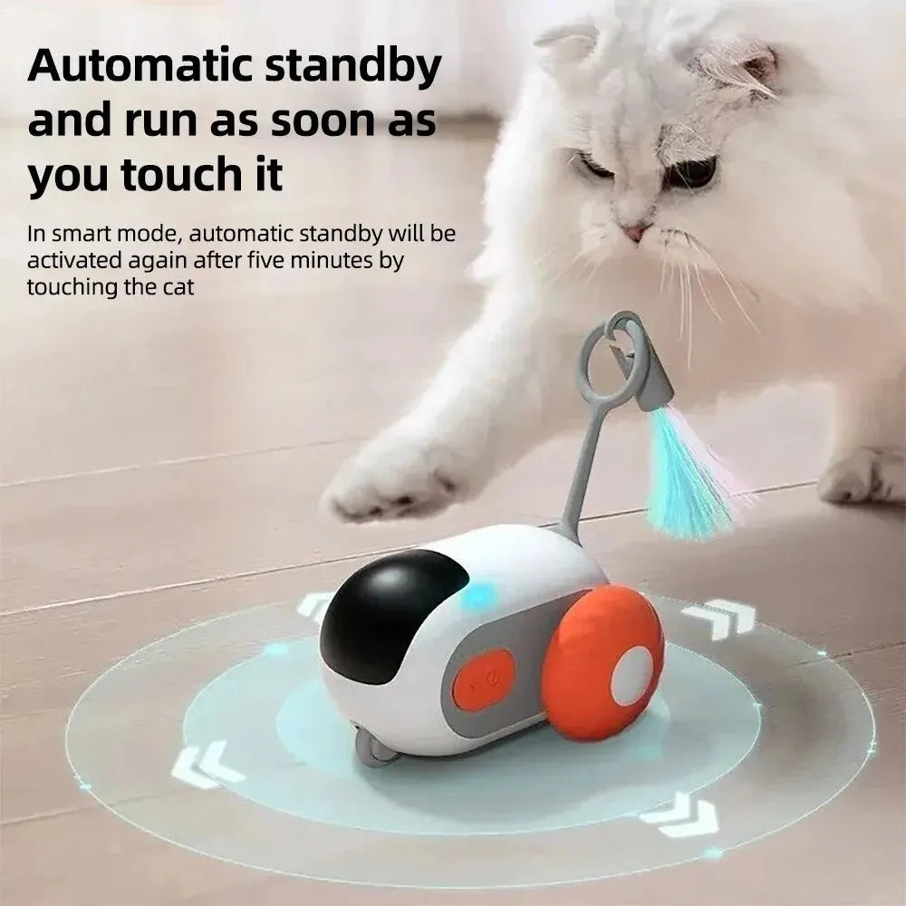 Blue remote-controlled smart cat toy car with feather teaser attachment on hard floor