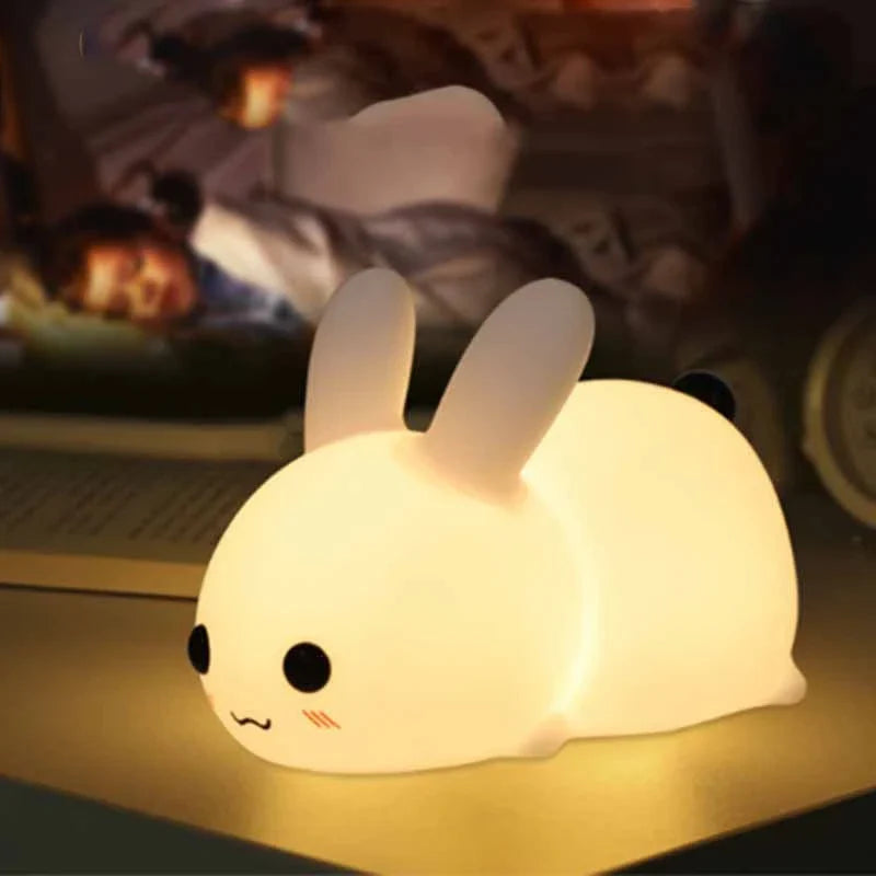 Dimmable rabbit-shaped night light with soft silicone design and adjustable brightness for children's bedrooms