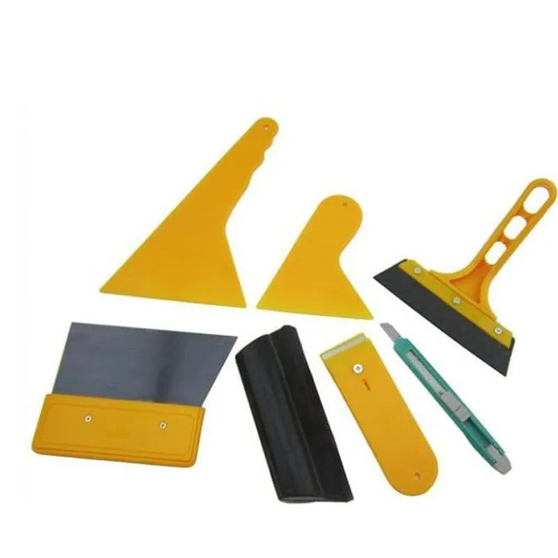 Seven-piece car foil tool set with scrapers, knives, and pressing block for film application