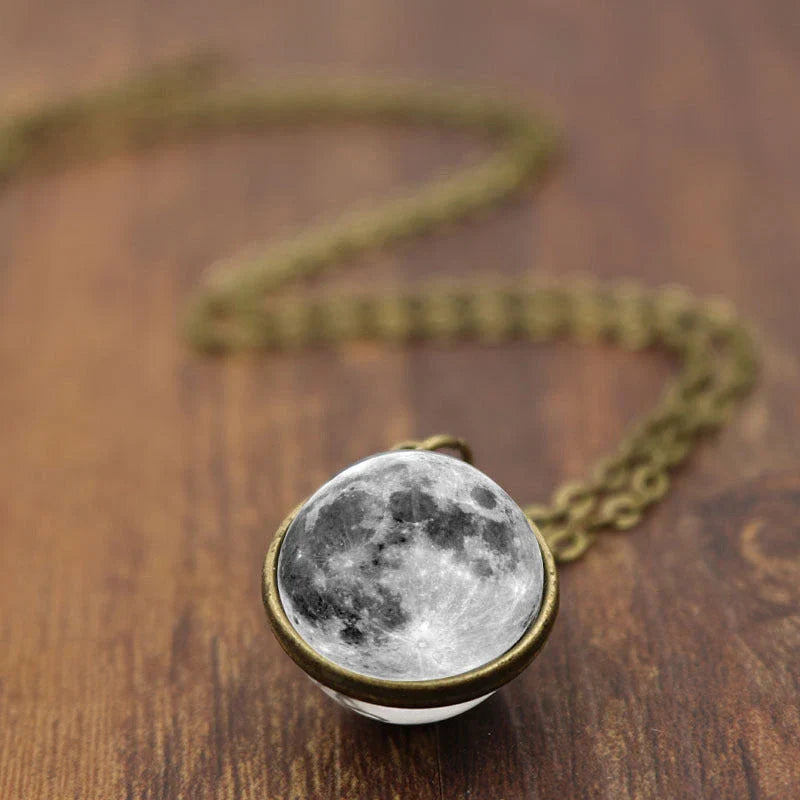 Mesmerizing double-sided galaxy pendant necklace in various celestial patterns and colors