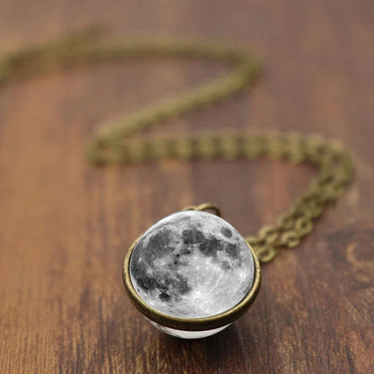 Mesmerizing double-sided galaxy pendant necklace in various celestial patterns and colors