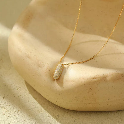 Stainless steel initial pendant necklace with zircon accents, personalized with your choice of letter.