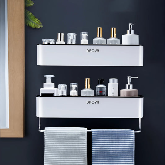 Plastic bathroom wall shelf with hole-free installation in a grey finish, holding shampoo and shower gel bottles.