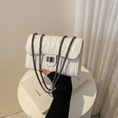 Retro textured diamond pattern women's small bag in beige colour with soft carry handle and single shoulder strap