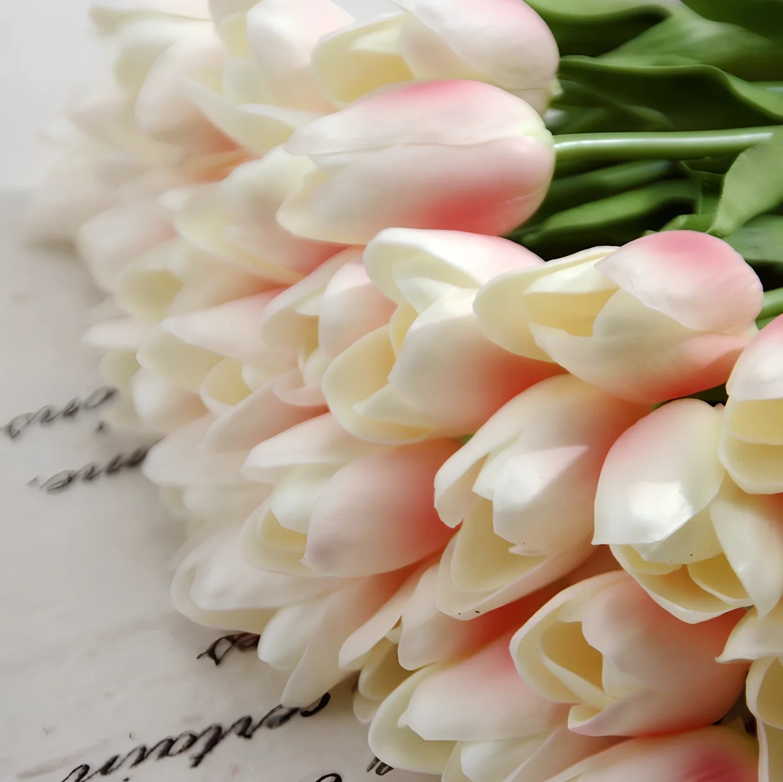 Artificial flower arrangement with 2.7cm diameter head and 11cm leaves in champagne colour