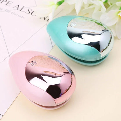 Portable vibrating hair massage comb with ionic technology for on-the-go hair rejuvenation and styling