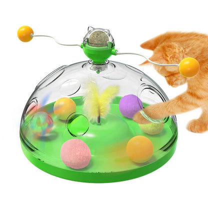 Interactive cat toy with twirling sticks and luminous catnip ball