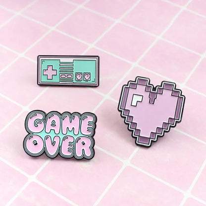 Stereo game console badge made from alloy metal in three colour options for bag mounting.