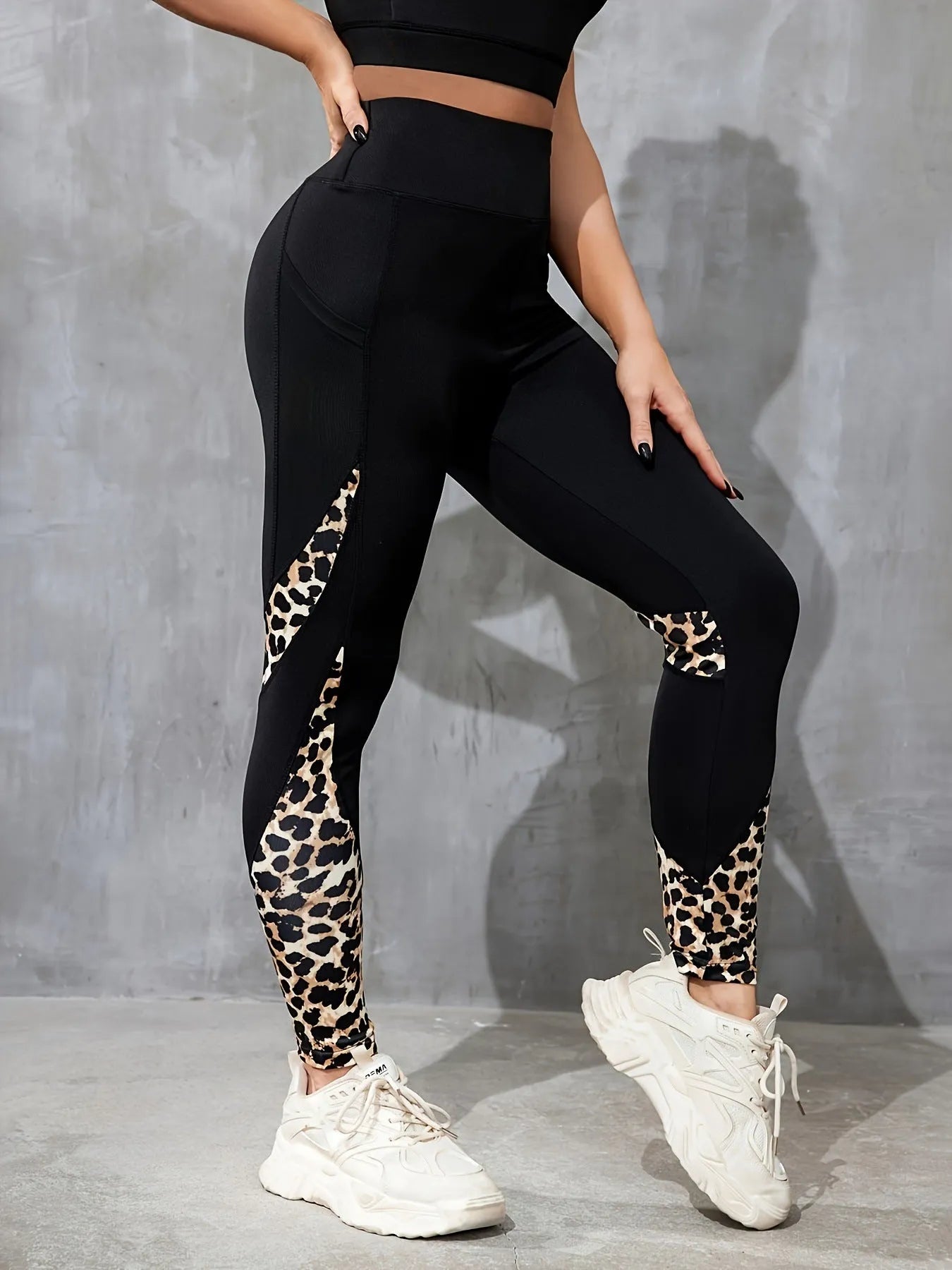 Women's polyester yoga leggings with high-waist design and contrast patchwork patterns in various animal print styles