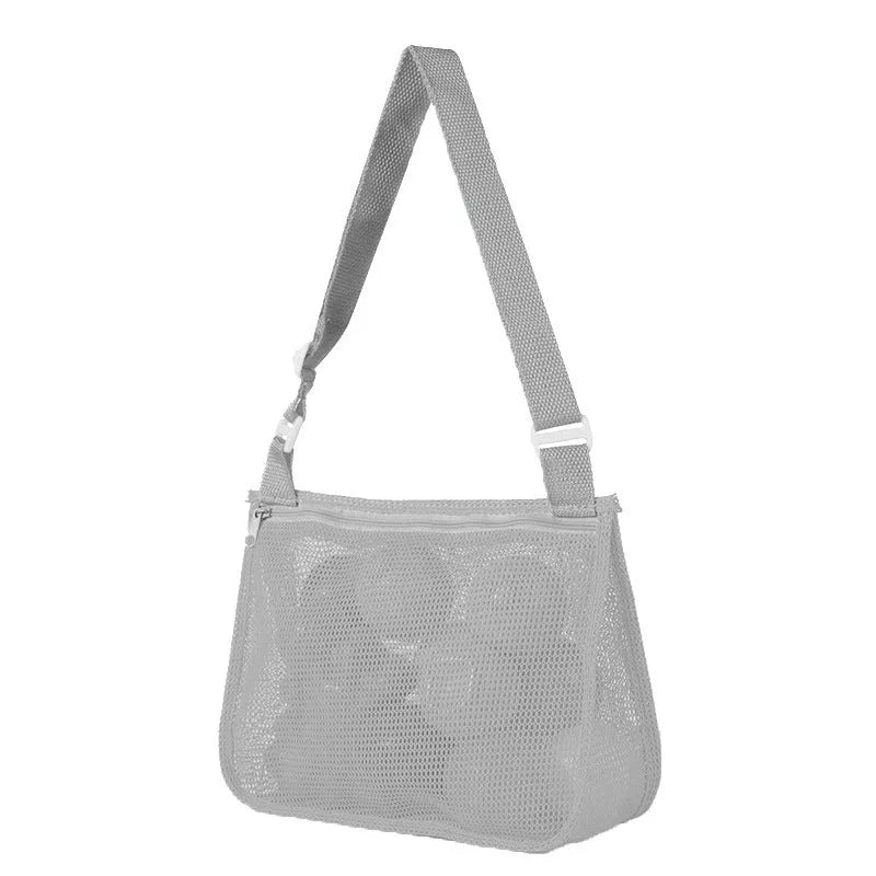 Blue children's travel storage organiser bag with nylon mesh construction and shoulder strap