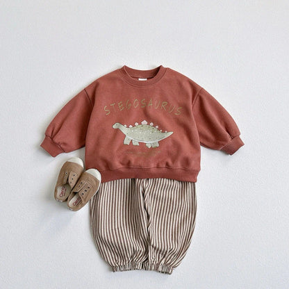 Children's beige sweatshirt with printed cartoon dinosaur design, pullover style without hood