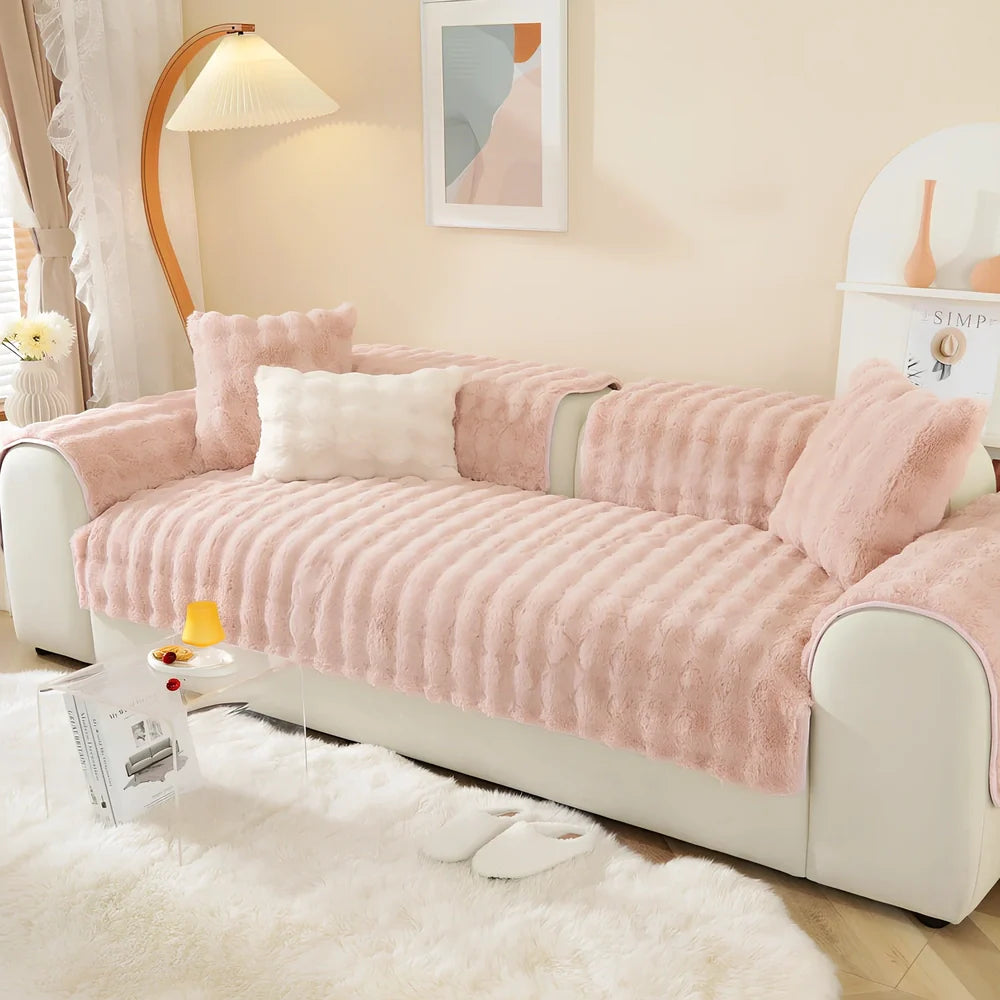 Square flannelette sofa cushion in light blue colour measuring 110x160cm on grey fabric sofa