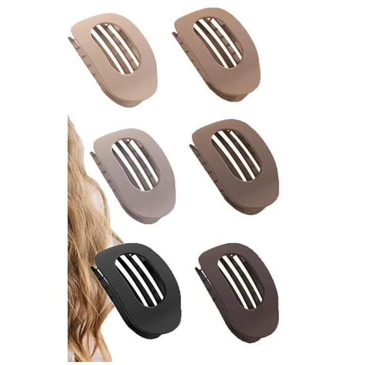 Six rose red plastic hair clips with frosted grip surface and geometric quadrilateral design