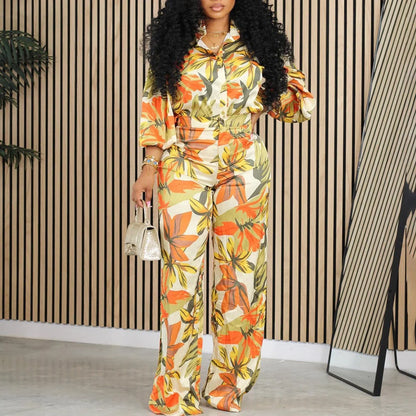 Red printed long sleeve shirt and wide leg trousers suit with polyester fabric on a hanger