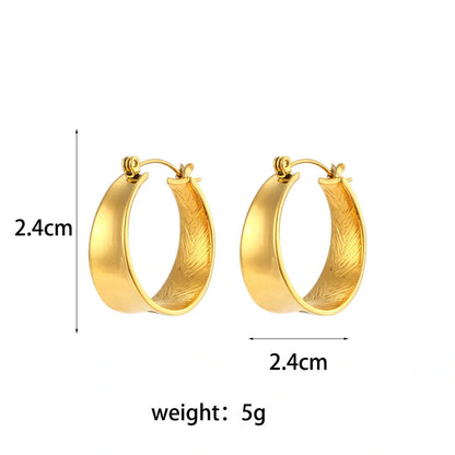 Geometric gradient gold earrings with ellipse design, perfect for women seeking modern elegance