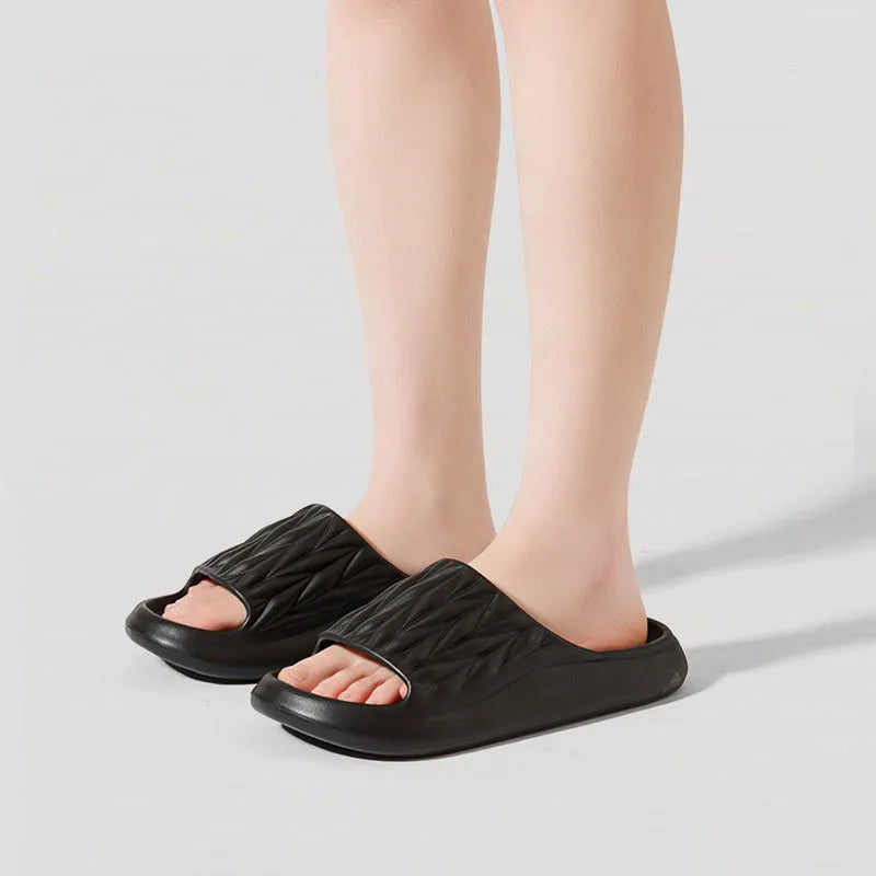 Leaf texture pattern EVA slippers in various colours showing non-slip sole design