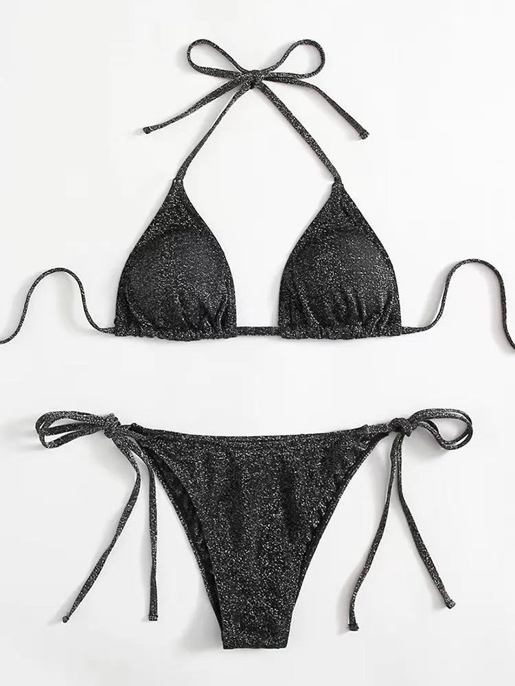 Women's khaki gold bandage style bikini with structured panels on a neutral background