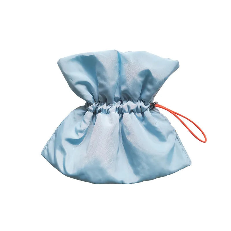 Soft blue adjustable Elizabethan recovery cone collar for a cat or small dog on a white background.