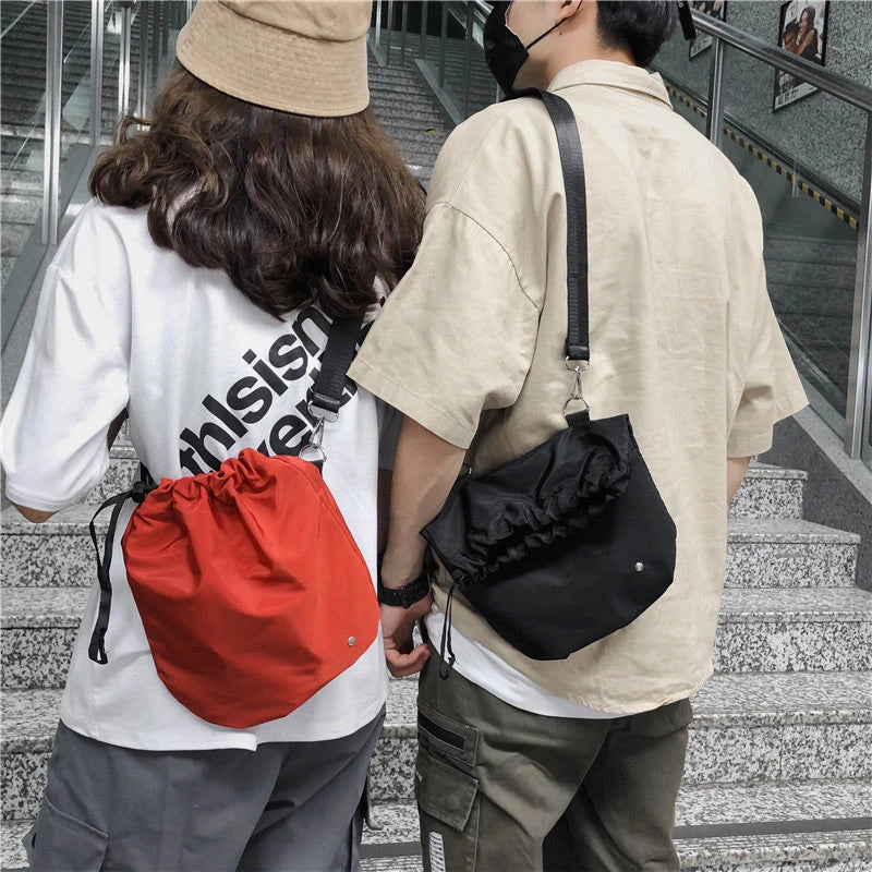 Stylish nylon drawstring waist bag in various colors for hands-free convenience and fashionable everyday carry