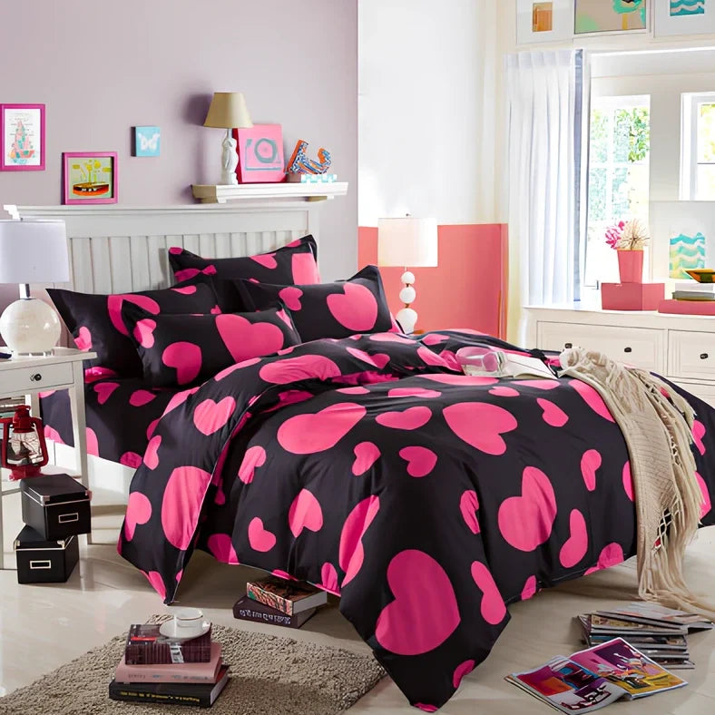 Three-piece cotton bedding set with blue geometric pattern showing duvet cover, fitted sheet, and two pillowcases on a UK double bed