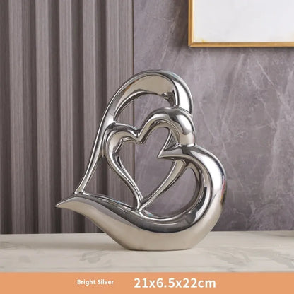 Modern geometric heart ornament in white porcelain with metallic colour finish options