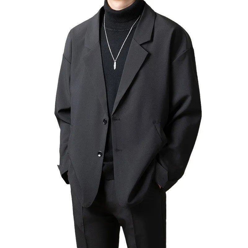 Casual loose-fit suit jacket in light business style, available in multiple colours and sizes.