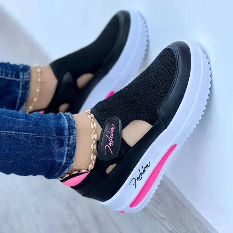 Breathable mesh sneakers with low-profile wedge heel and non-slip rubber outsole, available in red, black, blue, and pink colors