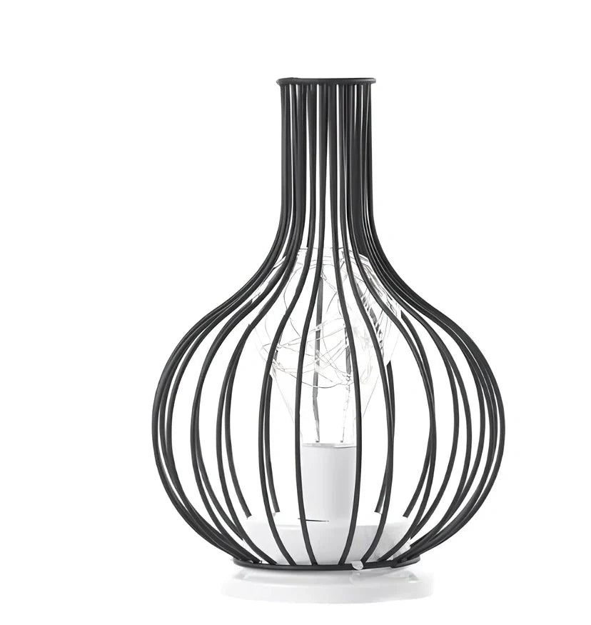 Minimalist hollow table lamp in red wine bottle design with wrought iron construction and warm white LED illumination