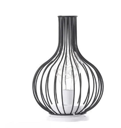 Minimalist hollow iron table lamp with warm white LED light in red wine glass design