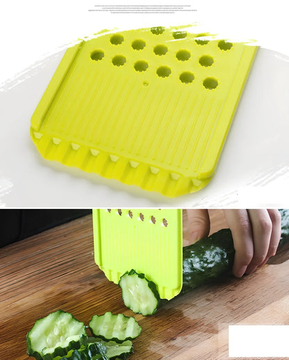 Multi-function stainless steel vegetable slicer with four blades, hand protector, and clear collection box, 26x10x10cm size