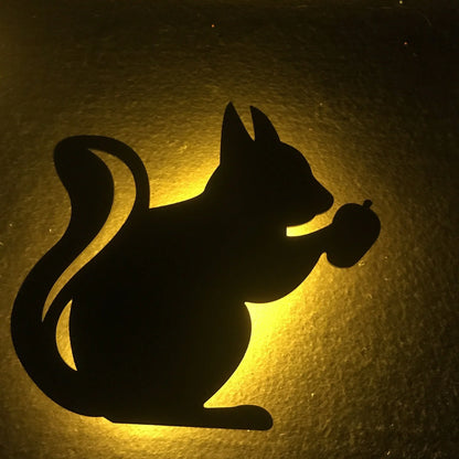 Illuminating pet-themed night light with smart sound sensor and customizable design