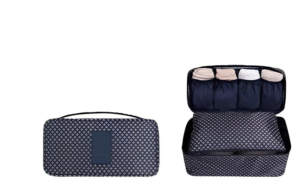 Compact travel underwear organizer in navy blue, 28cm x 14cm x 14.5cm with mesh pockets for packing