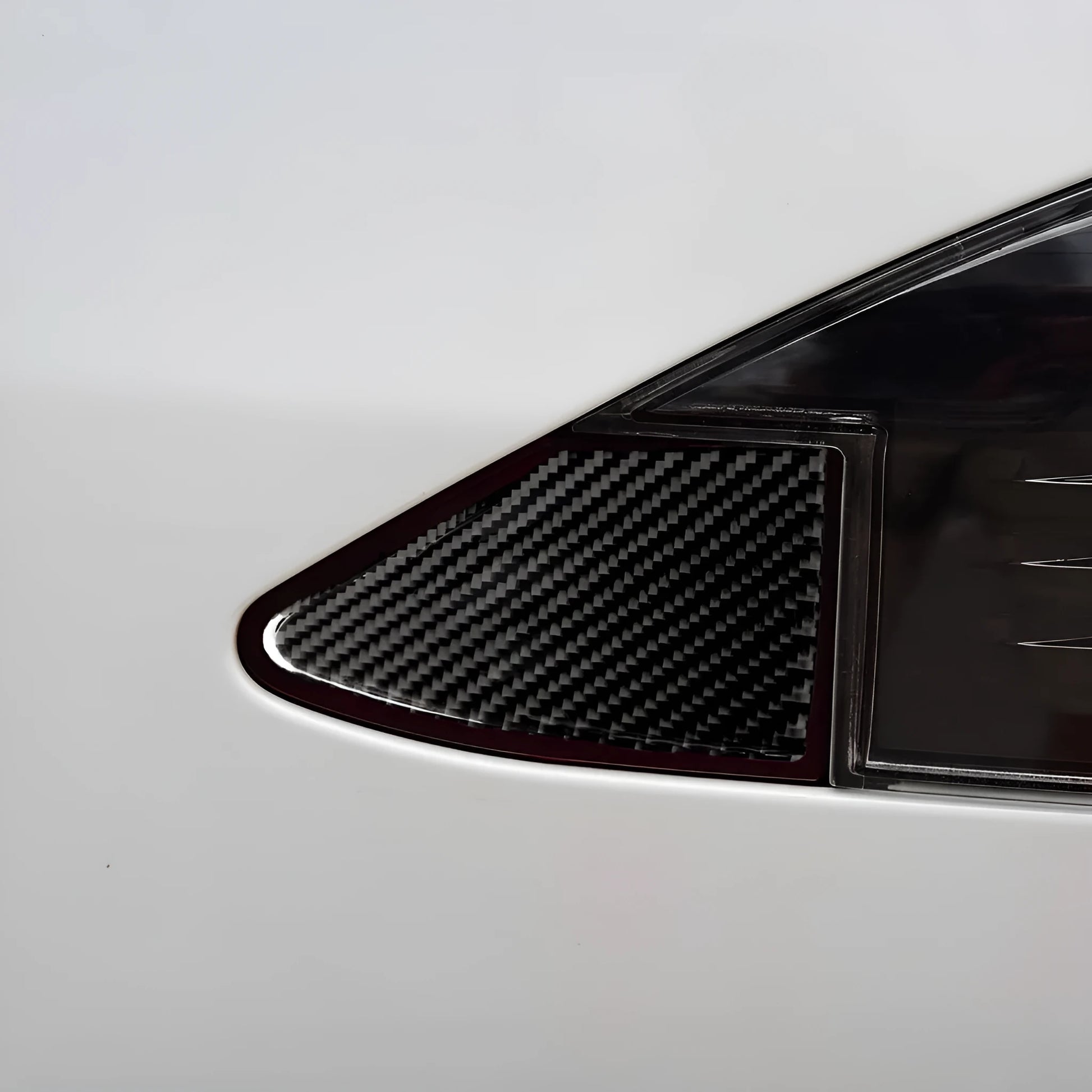 Carbon fibre USB charging port panel sticker for vehicle dashboards with adhesive backing